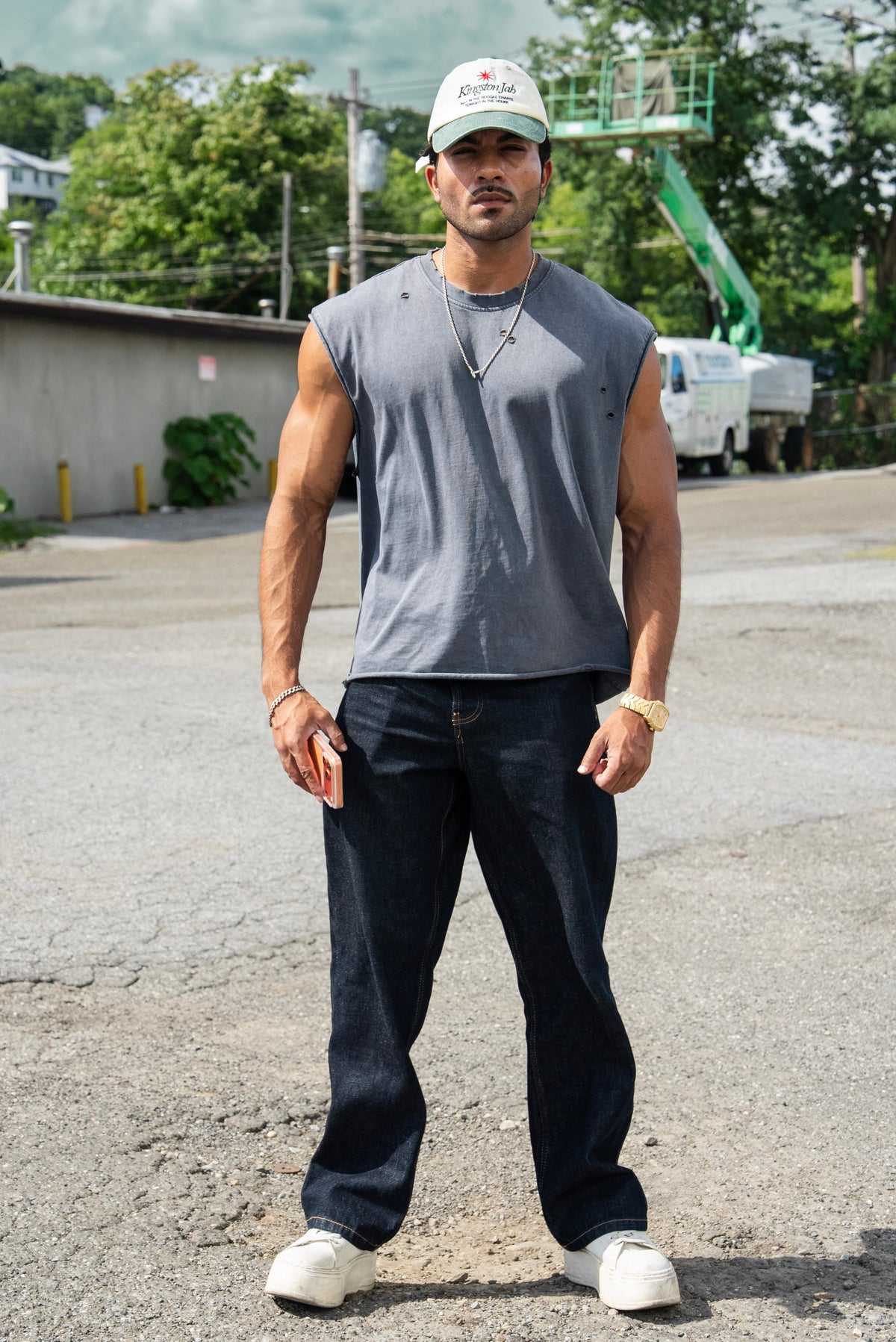 Shadow Cropped Tank in Acid Wash on model, full front view styled with dark denim